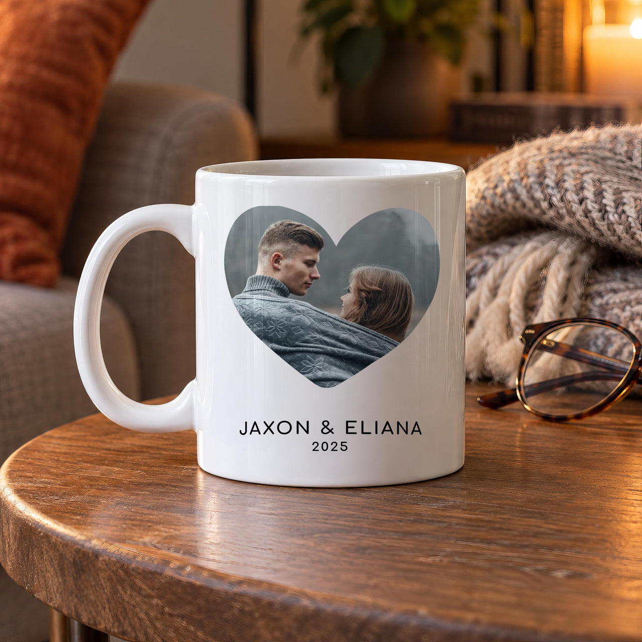 Heart photo mug in white on a wooden desk by a window