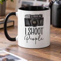 Photographer mug: white mug with black handle and inside, a watercolour vintage camera and the words I SHOOT People