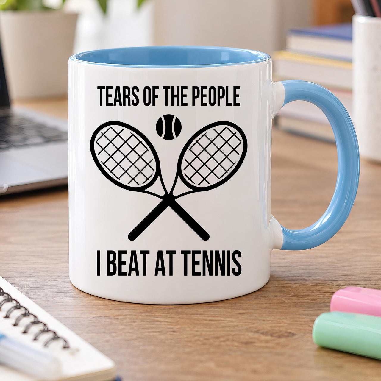Tennis mug: white mug with light blue handle and inside, crossed rackets and ball, Tears of the People I Beat at Tennis