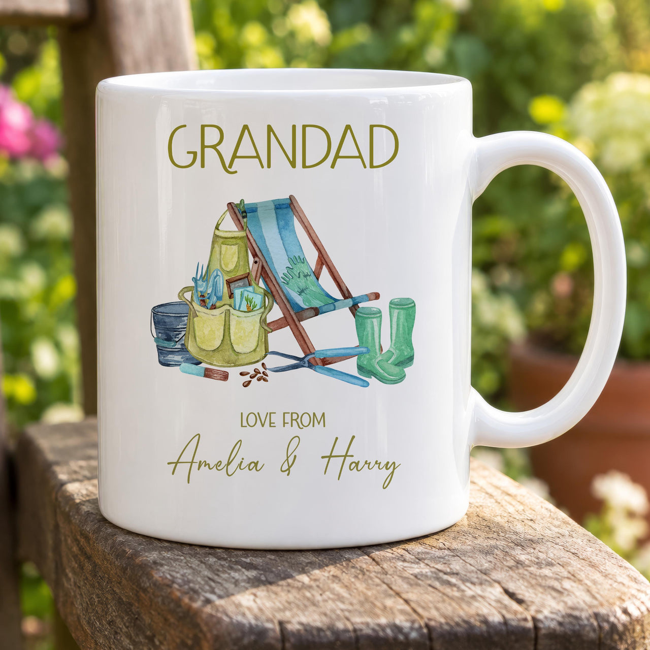 Personalised grandad garden mug: white mug with GRANDAD, a watercolour deckchair, wellies and tools, love from Amelia & Harry