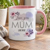 Love You Mum mug: white mug with pink handle, watercolour flowers and lilac splashes, MUM in grey and Love Rosie