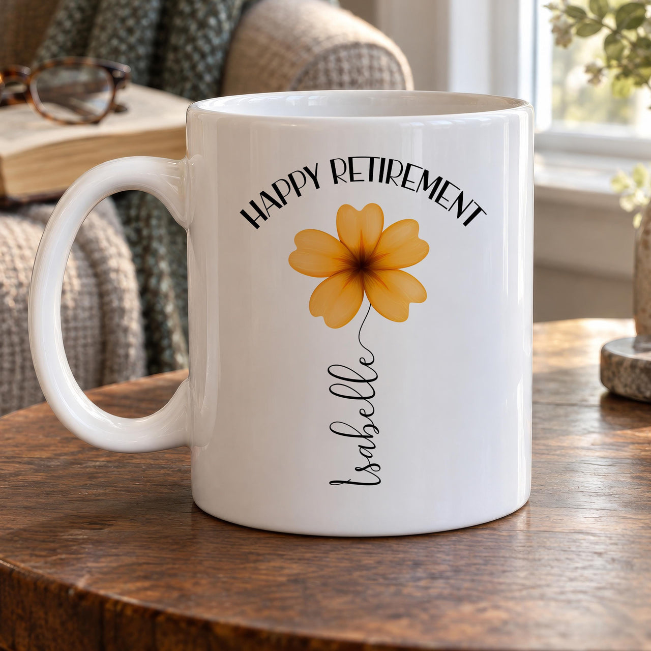 Personalised retirement mug: white mug with HAPPY RETIREMENT above an orange flower whose stem spells Isabelle in script