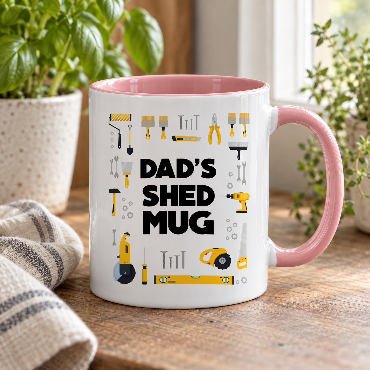 Dad's Shed mug with a pink inside and handle