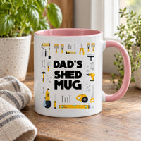 Dad's Shed mug with a pink inside and handle