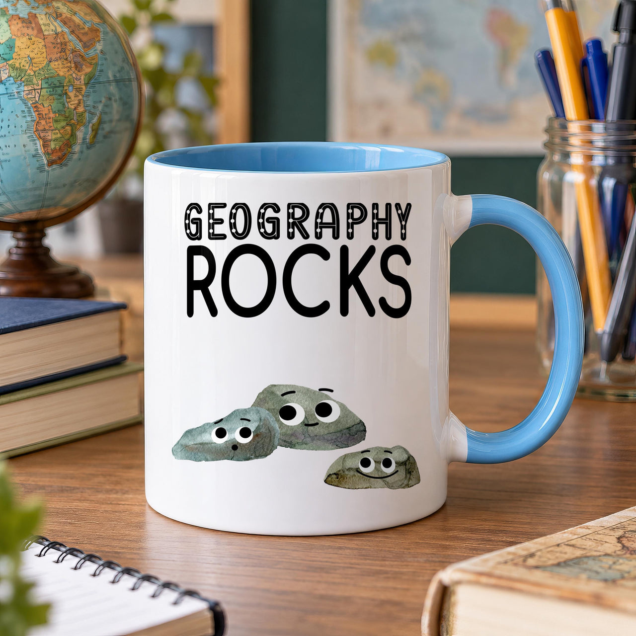 Geography Rocks mug with a light blue inside and handle