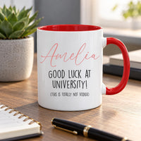 Personalised university mug: red-handled mug with Amelia in pink script and GOOD LUCK AT UNIVERSITY! in black