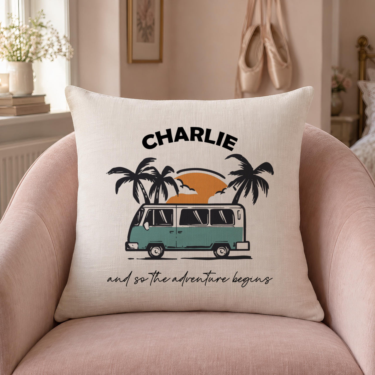 Linen-look cushion with campervan, palm trees, 'CHARLIE' and 'and so the adventure begins', pink chair - personalised cushion
