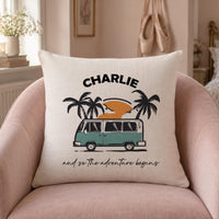 Linen-look cushion with campervan, palm trees, 'CHARLIE' and 'and so the adventure begins', pink chair - personalised cushion