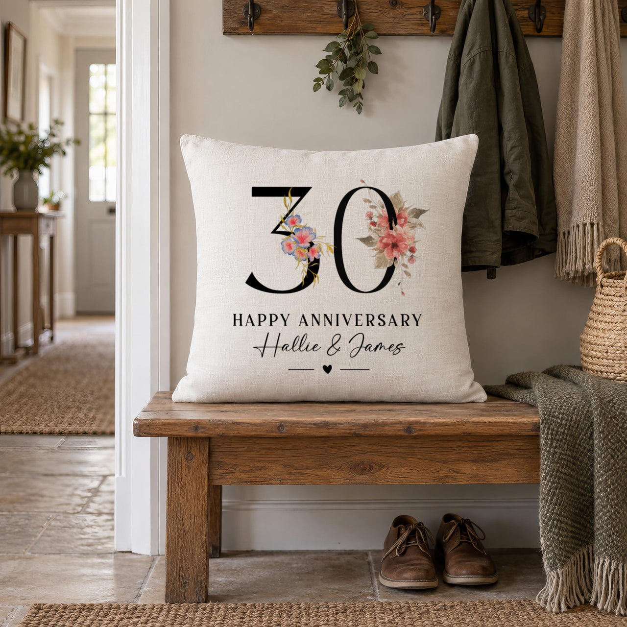 Linen-look floral '30' 'HAPPY ANNIVERSARY' cushion with 'Hallie & James' on a hallway bench - personalised cushion