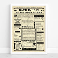 White framed 1969 retro newspaper print reading 'The year George was born' with news, prices and top songs