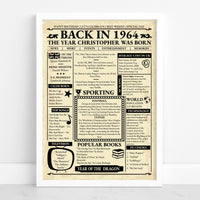 White framed 1964 birthday newspaper print with name headline, songs, cinema, sport and prices from that year