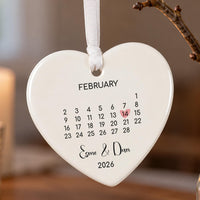 Anniversary ceramic heart ornament: February calendar with 14 circled by a pink heart, Esme & Dan and 2026