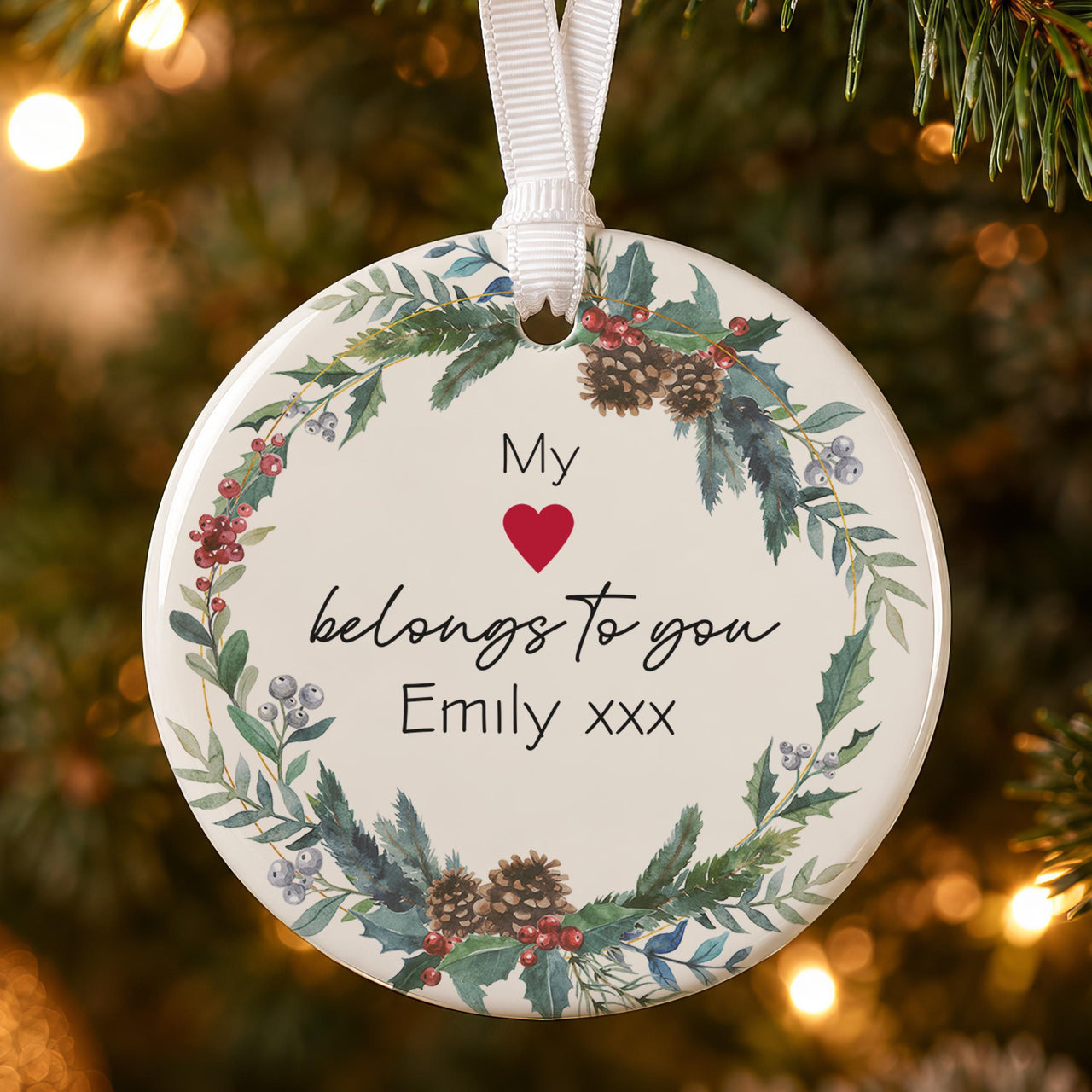Heart wreath ceramic bauble: holly, pine cone and berry wreath around My, a red heart, belongs to you and Emily xxx
