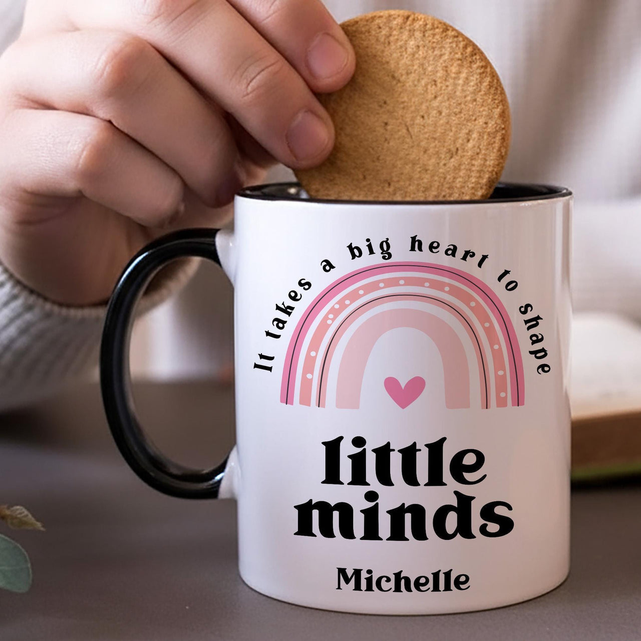 Personalised teacher mug: black-handled mug with a pink rainbow, It takes a big heart to shape little minds and Michelle