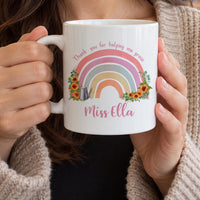 Personalised teacher mug: pastel rainbow with sunflowers, Thank you for helping me grow and Miss Ella in pink script