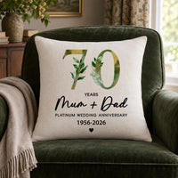 Linen-look cushion with leafy green '70', 'Mum + Dad', 'PLATINUM WEDDING ANNIVERSARY 1956-2026' - personalised cushion