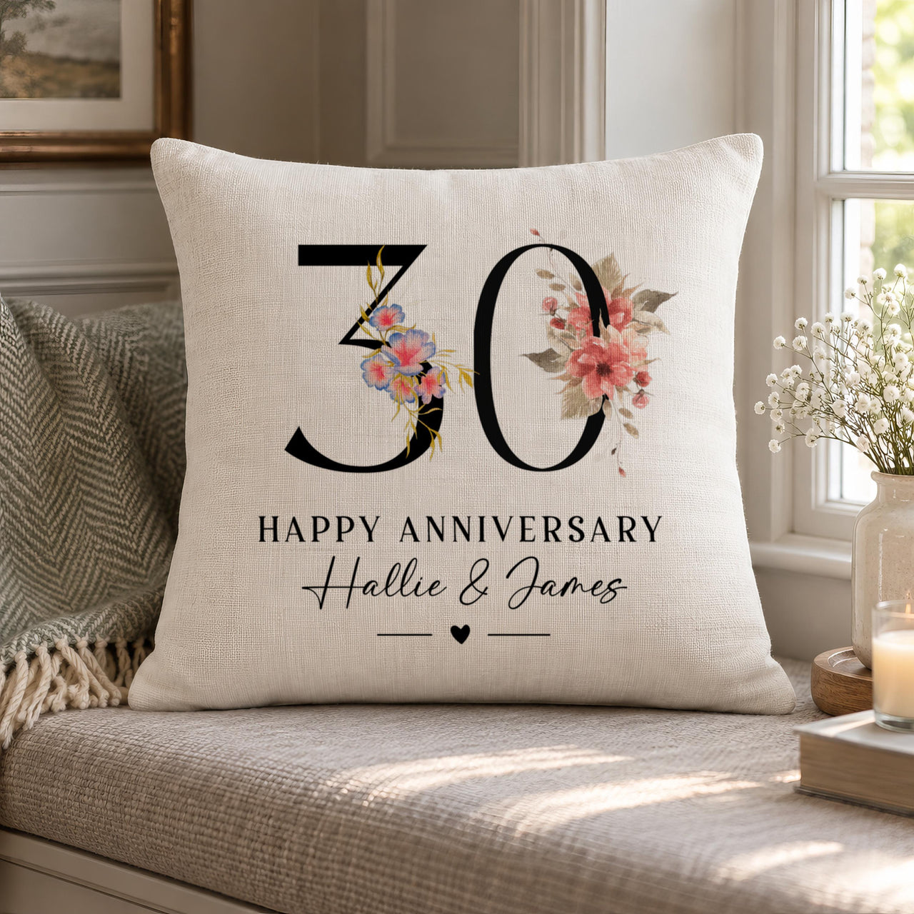 Linen-look cushion with floral '30', 'HAPPY ANNIVERSARY' and 'Hallie & James' on a window seat - personalised cushion