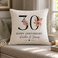 Linen-look cushion with floral '30', 'HAPPY ANNIVERSARY' and 'Hallie & James' on a window seat - personalised cushion