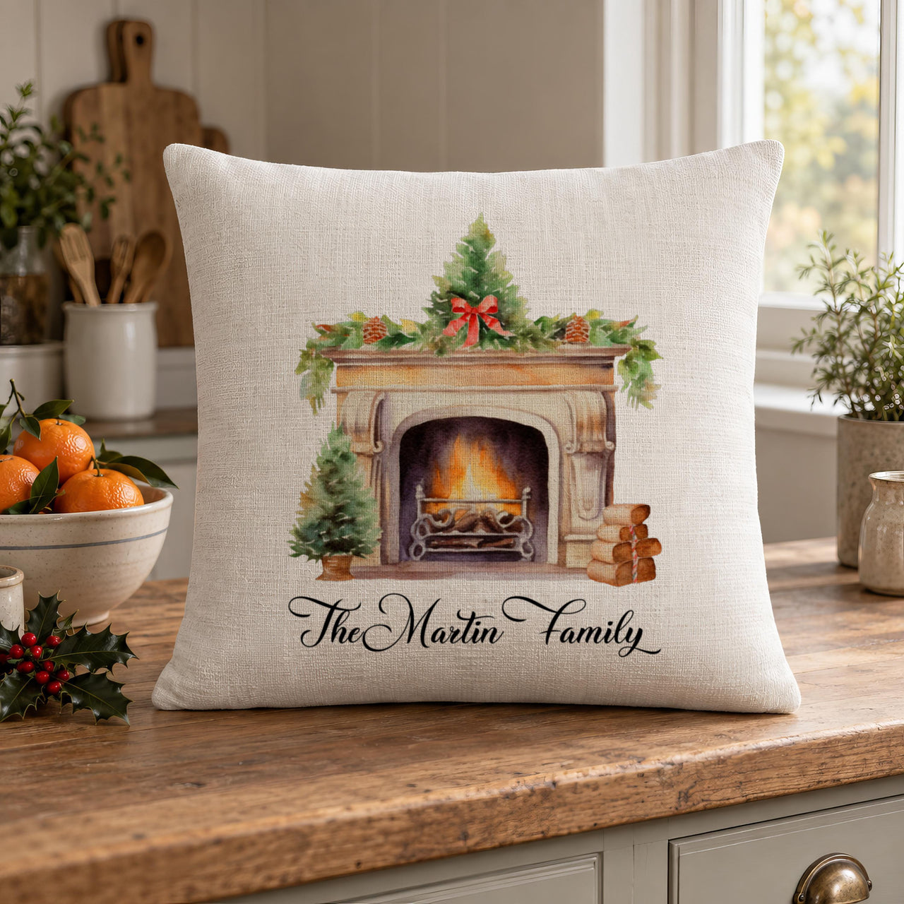 Linen-look Christmas fireplace cushion 'The Martin Family' on a kitchen worktop with oranges and holly - personalised cushion
