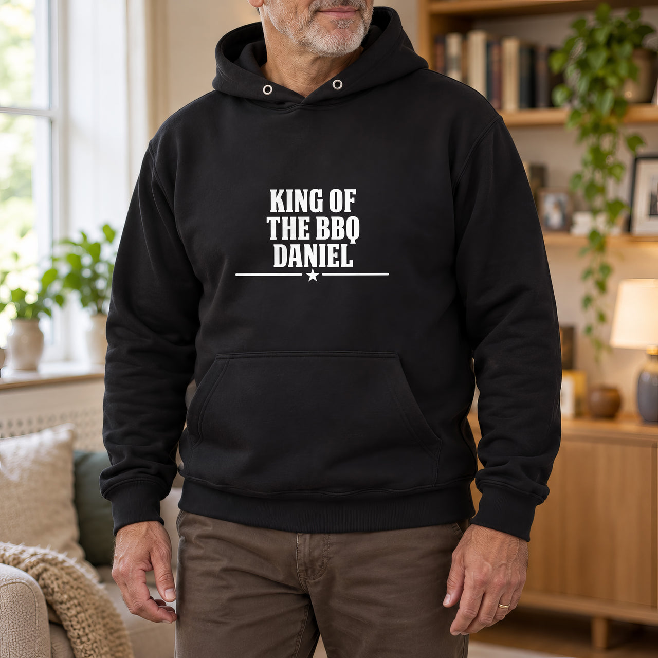 King Of The BBQ Personalised Iron-On Transfer, shown on a black hoodie