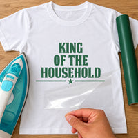 White T-shirt mockup with green bold 'King of the Household' vinyl and a star divider line