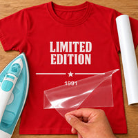 Red T-shirt with white 'LIMITED EDITION', star divider and '1991', birth year iron-on transfer with film being lifted