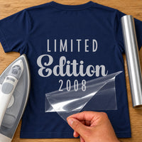 Back of navy T-shirt with silver 'LIMITED' capitals, 'Edition' script and '2008' iron-on transfer, iron and silver vinyl roll