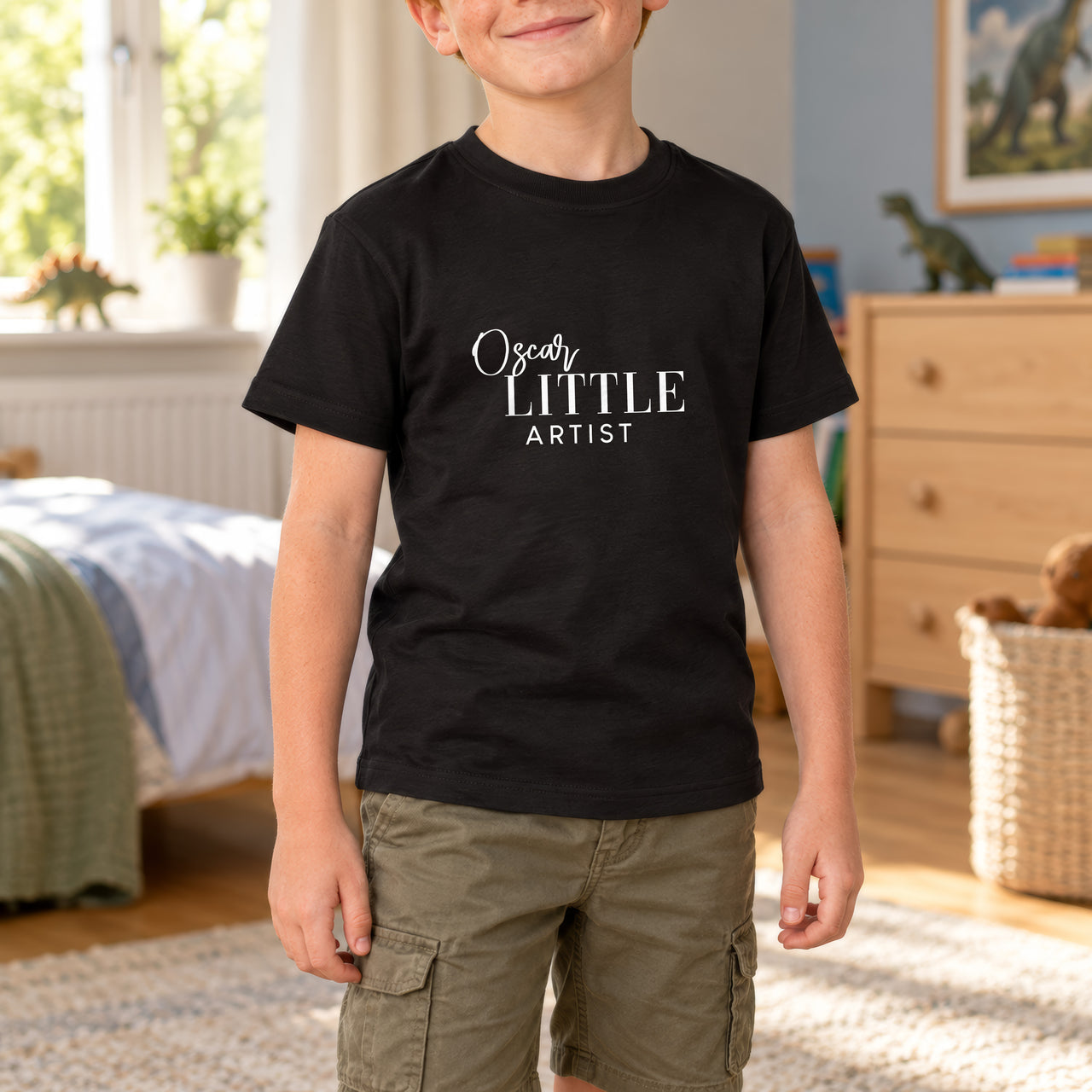 Little Artist Iron-On Transfer - Personalised Name Design, shown on a black kids t-shirt