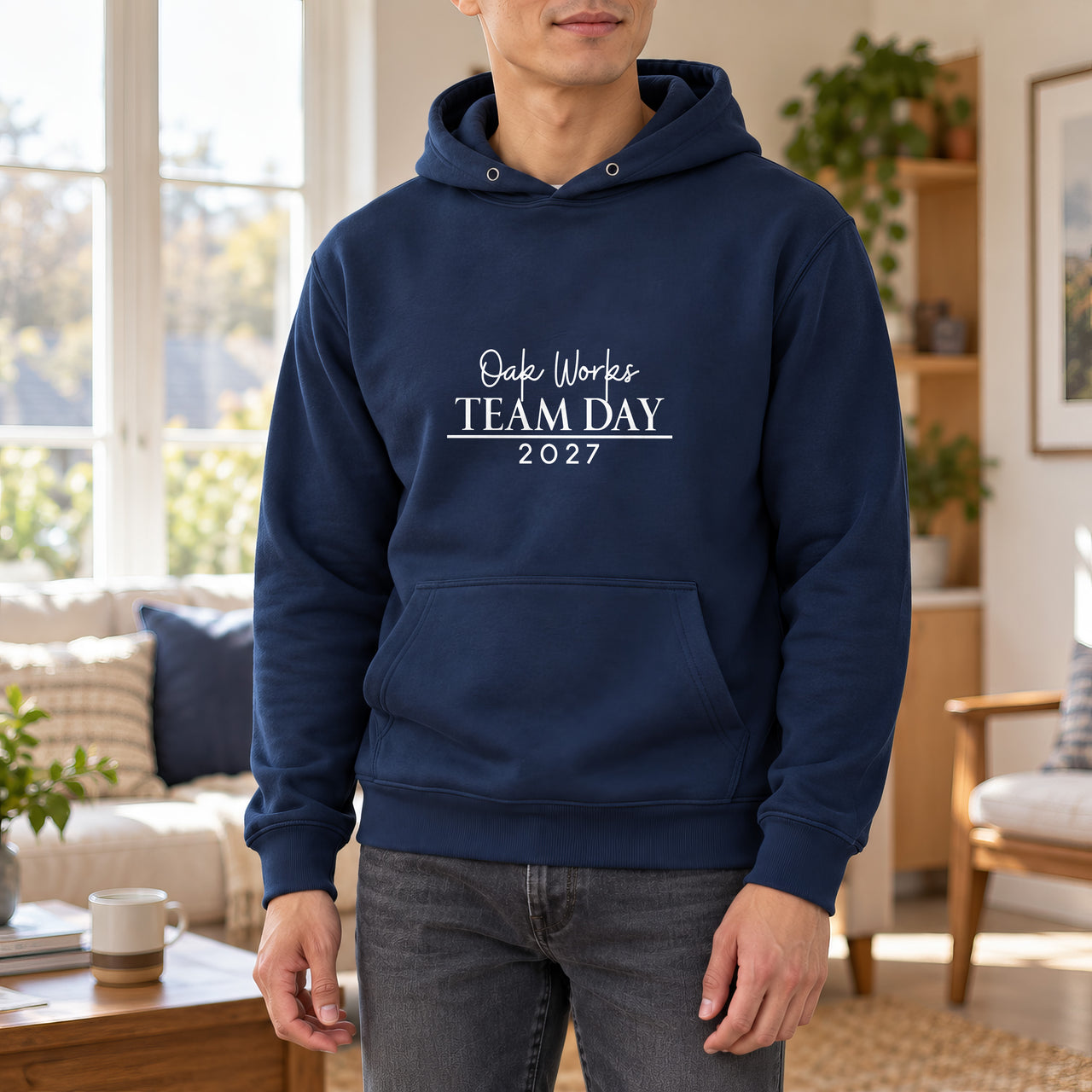 Iron On Corporate Text, shown on a navy hoodie