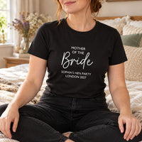 Black T-shirt with the Mother of the Bride Script Hen Weekend design printed on the chest