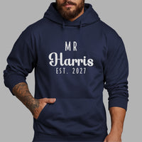Mr Surname Est. Iron-On Transfer - Personalised Wedding Couple Design shown on a hoodie