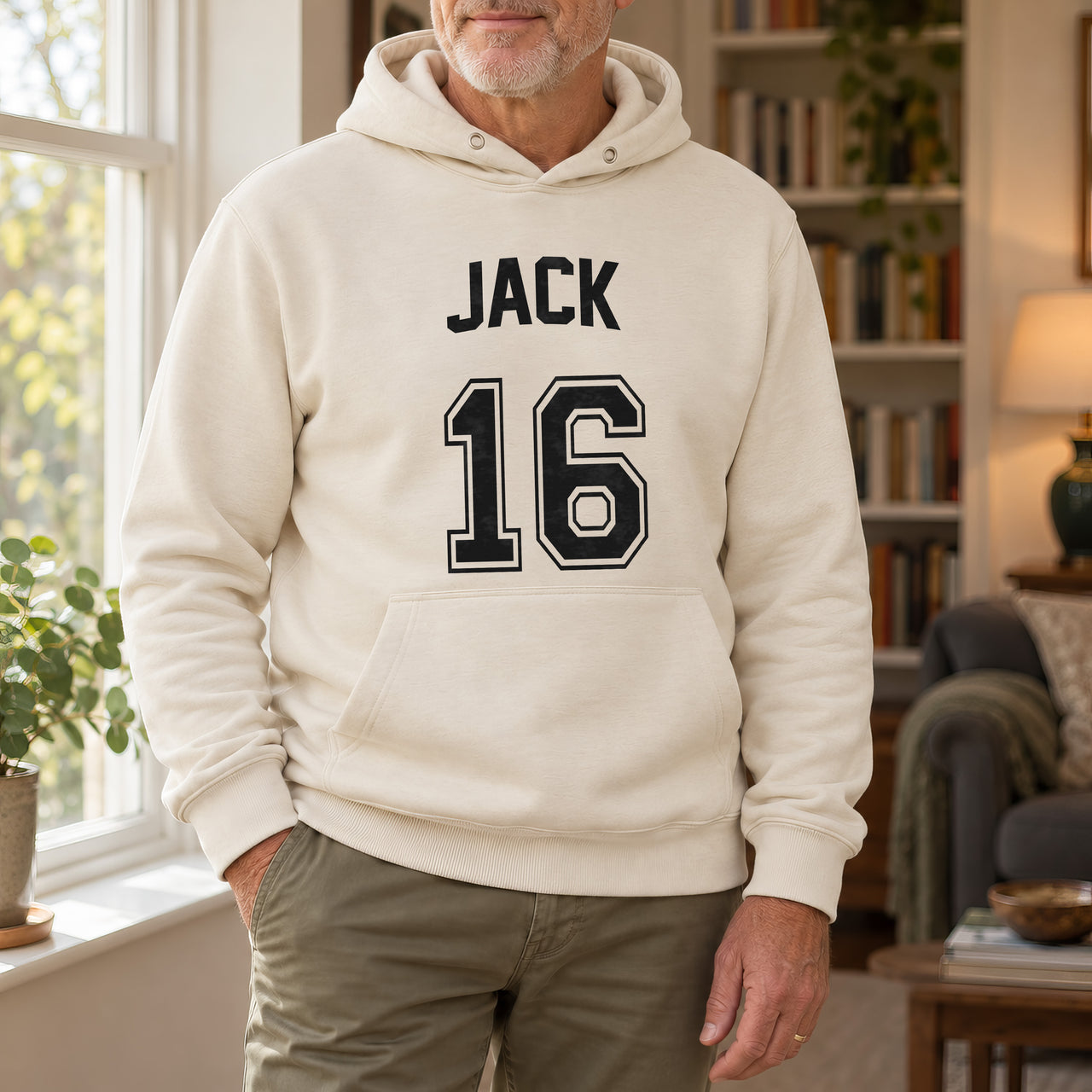 Sand hoodie with the Birthday Jersey Name and Age design printed on the chest