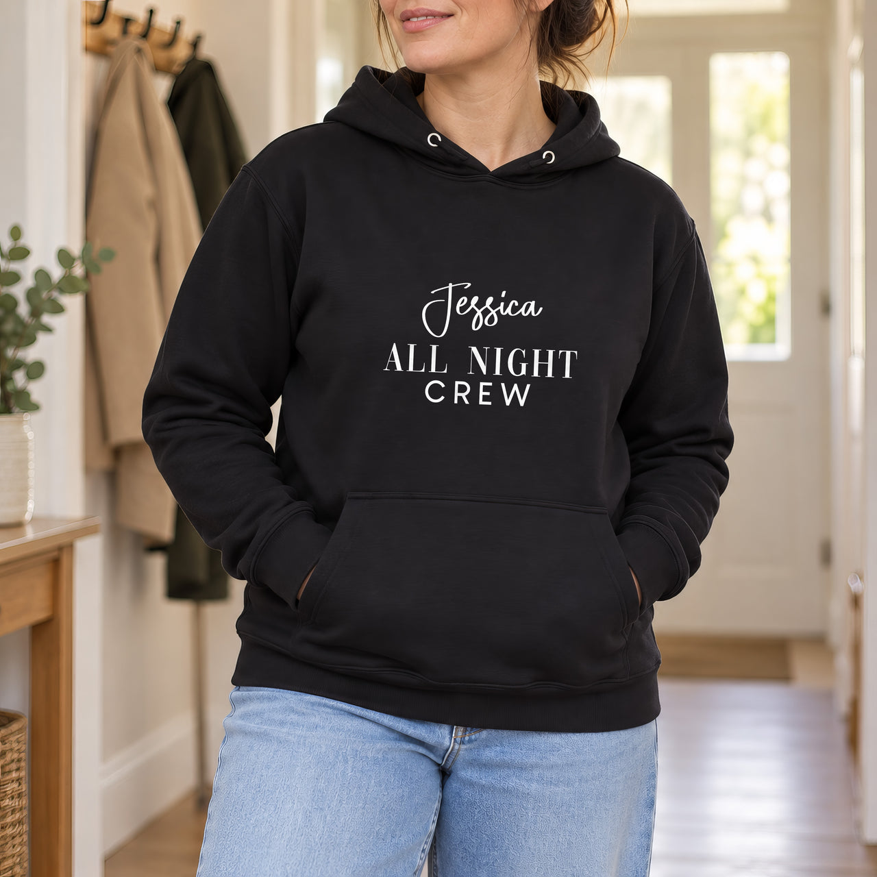 Black hoodie with the All Night Crew design printed on the chest