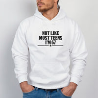 Not Like Most Teens I'm 67 Iron-On Transfer - Viral Age Joke Design shown on a hoodie