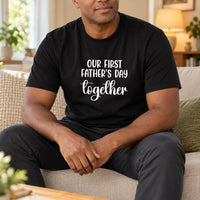 Black T-shirt with the Our First Father's Day Together design printed on the chest