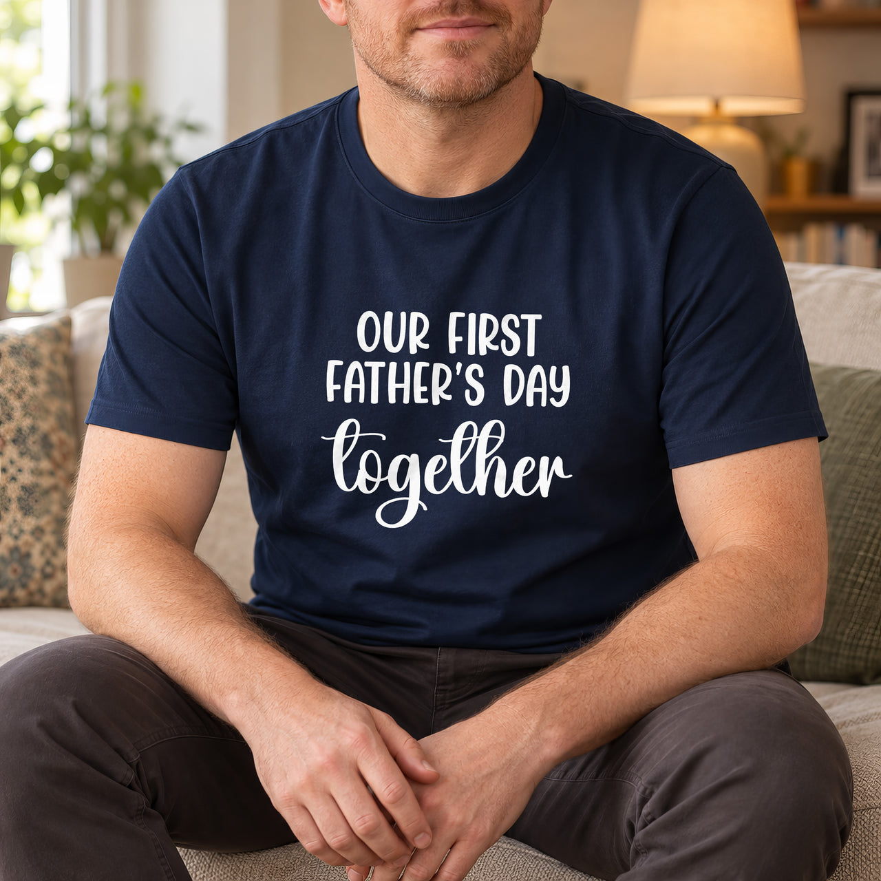 Navy T-shirt with the Our First Father's Day Together design printed on the chest