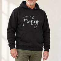Personalised Book Bag & PE Bag Name Iron-On Transfer, shown on a black hoodie