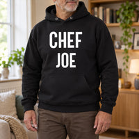Personalised Chef Iron-On Transfer - Custom Name Kitchen Design, shown on a black hoodie
