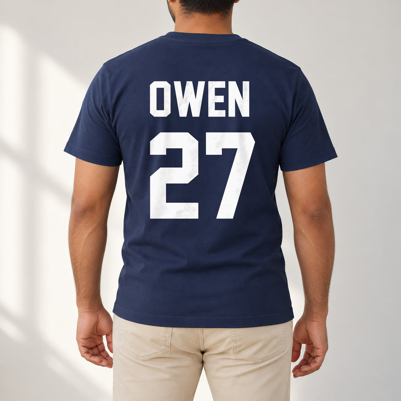 Navy T-shirt with the Cricket Name and Number design printed on the back