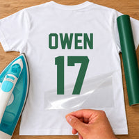 Personalised Cricket Shirt Name Number iron-on transfer: green OWEN 17 on a white T-shirt, film being peeled