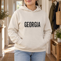 Personalised Nail Tech Name Iron-On Transfer, shown on a natural hoodie