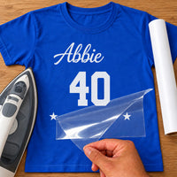 Royal blue T-shirt with white 'Abbie' script, '40' and stars, iron-on transfer, iron and white vinyl roll