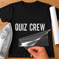 Pub Quiz Team Name iron-on transfer: white QUIZ CREW on a black T-shirt, film being peeled