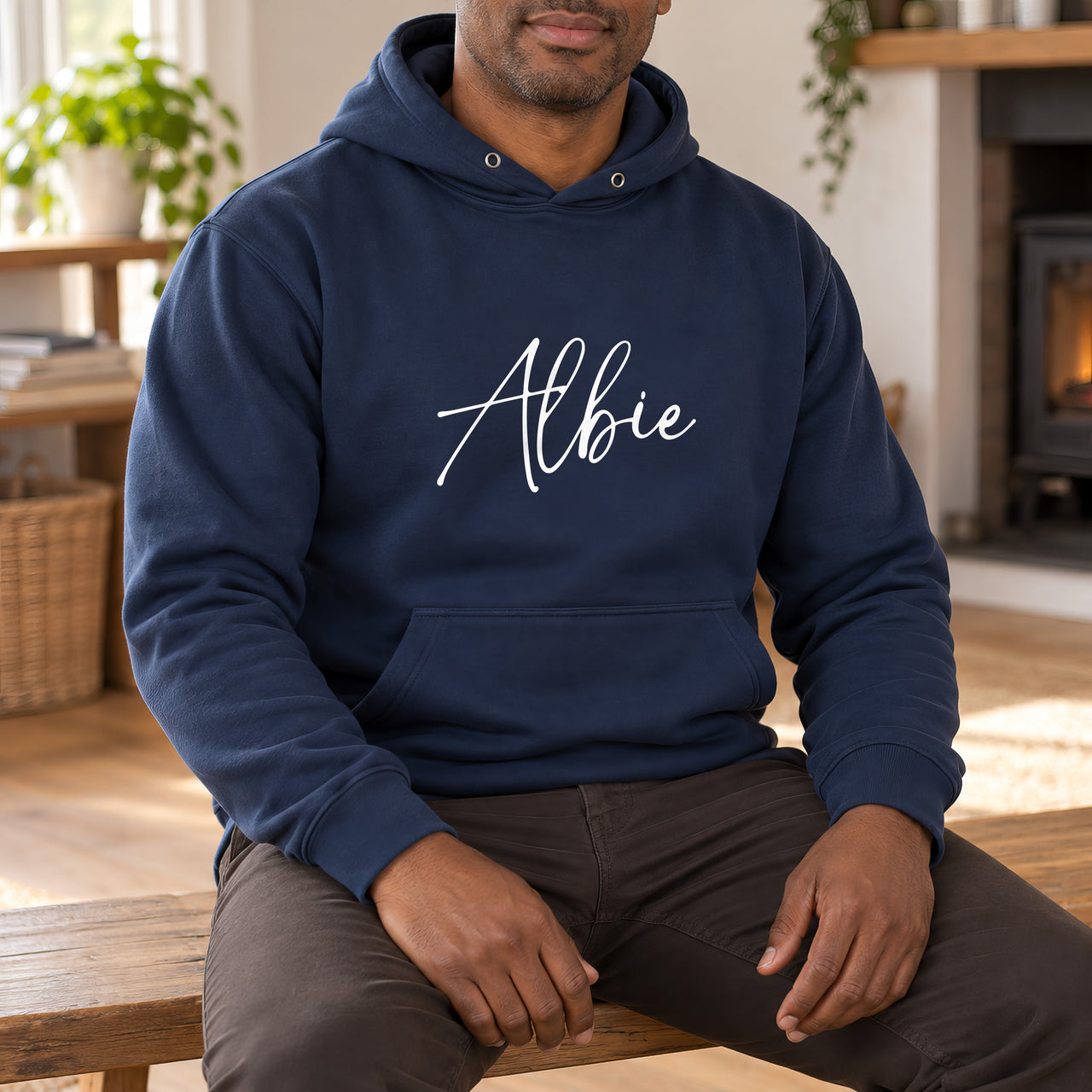 Personalised Pyjama Name Iron-On Transfer, shown on a navy hoodie