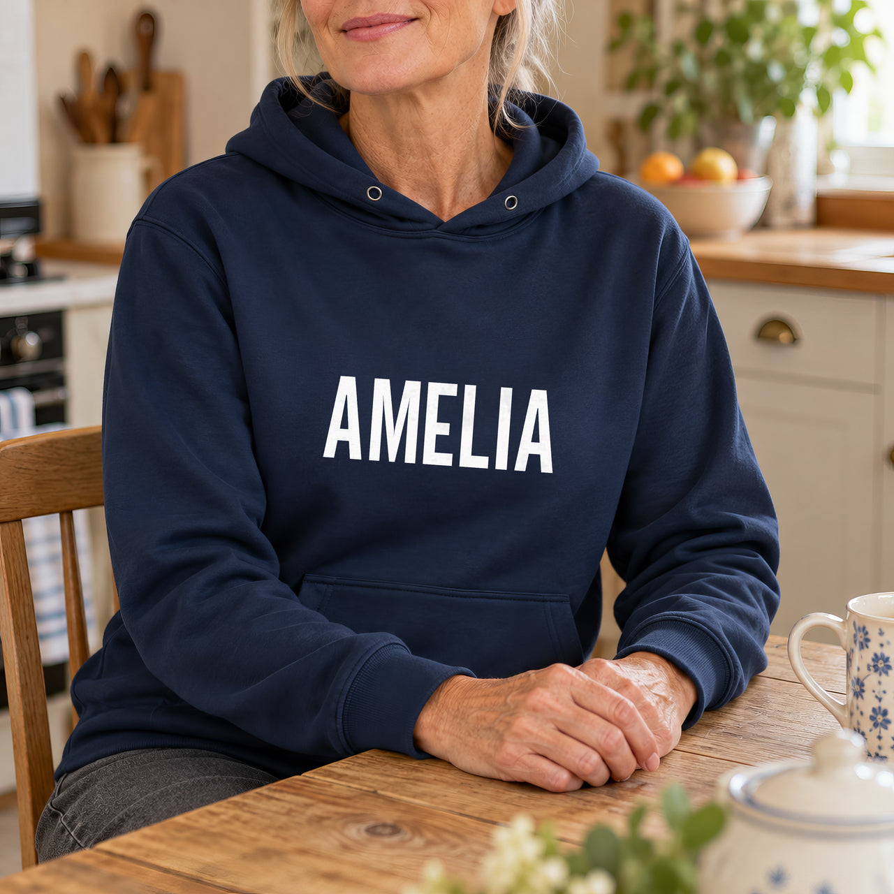 Personalised Student Nurse Name Iron-On Transfer, shown on a navy hoodie