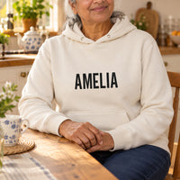 Personalised Student Nurse Name Iron-On Transfer, shown on a natural hoodie