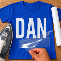 Window Cleaner Name iron-on transfer: white DAN on a royal blue T-shirt, film being peeled