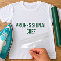 Professional Chef iron-on transfer: green PROFESSIONAL CHEF on a white T-shirt, film being peeled