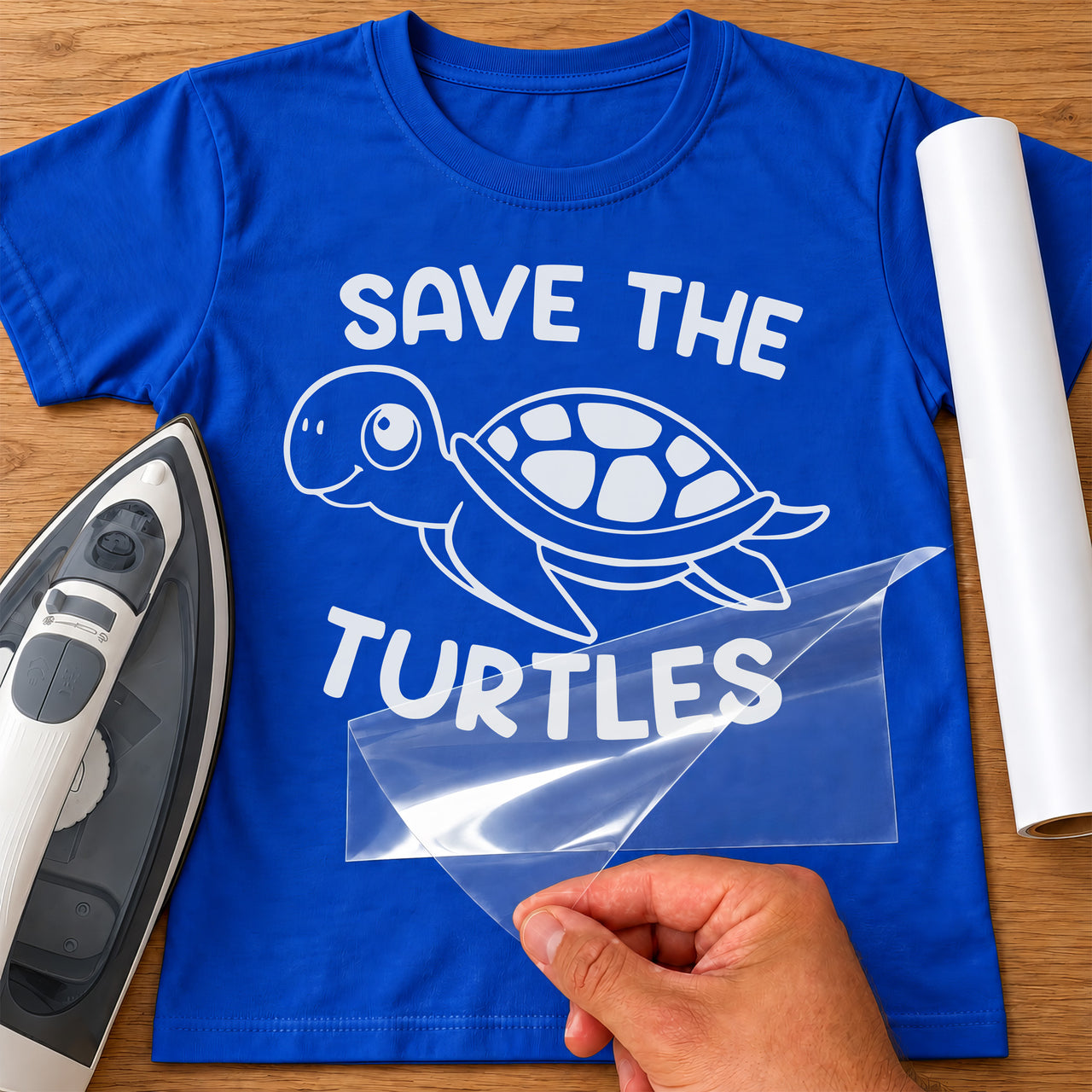 Blue T-shirt with white smiling sea turtle and 'SAVE THE TURTLES' lettering - iron-on vinyl transfer