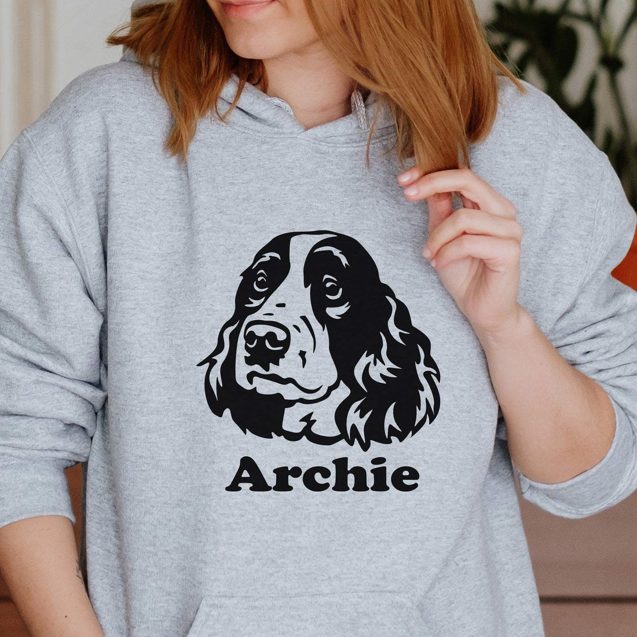 Springer Spaniel Iron-On Transfer - Personalised Pet Name Design shown on a hoodie
